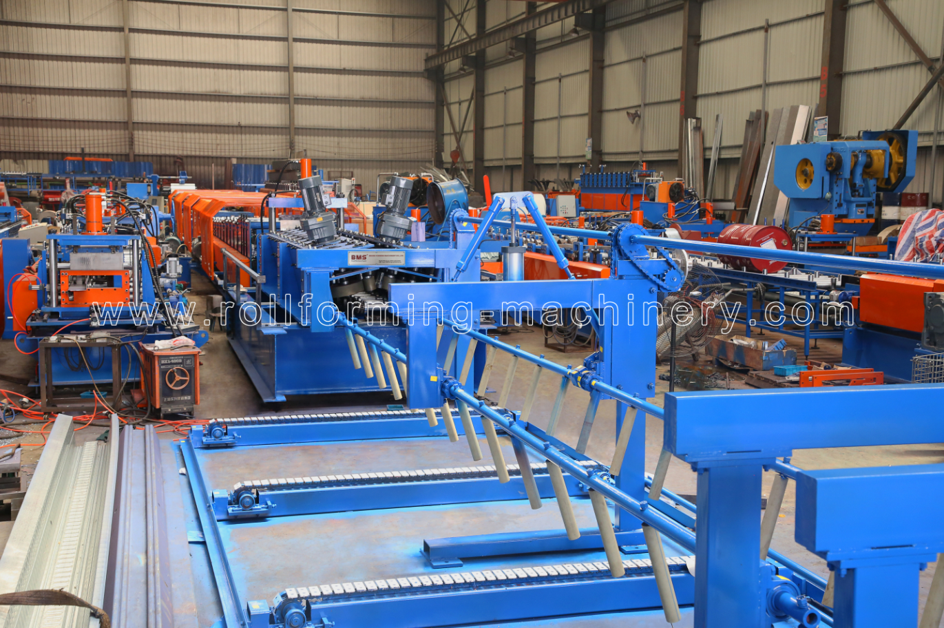 Memahami Proses Produksi Mesin Roll Forming Floor Deck